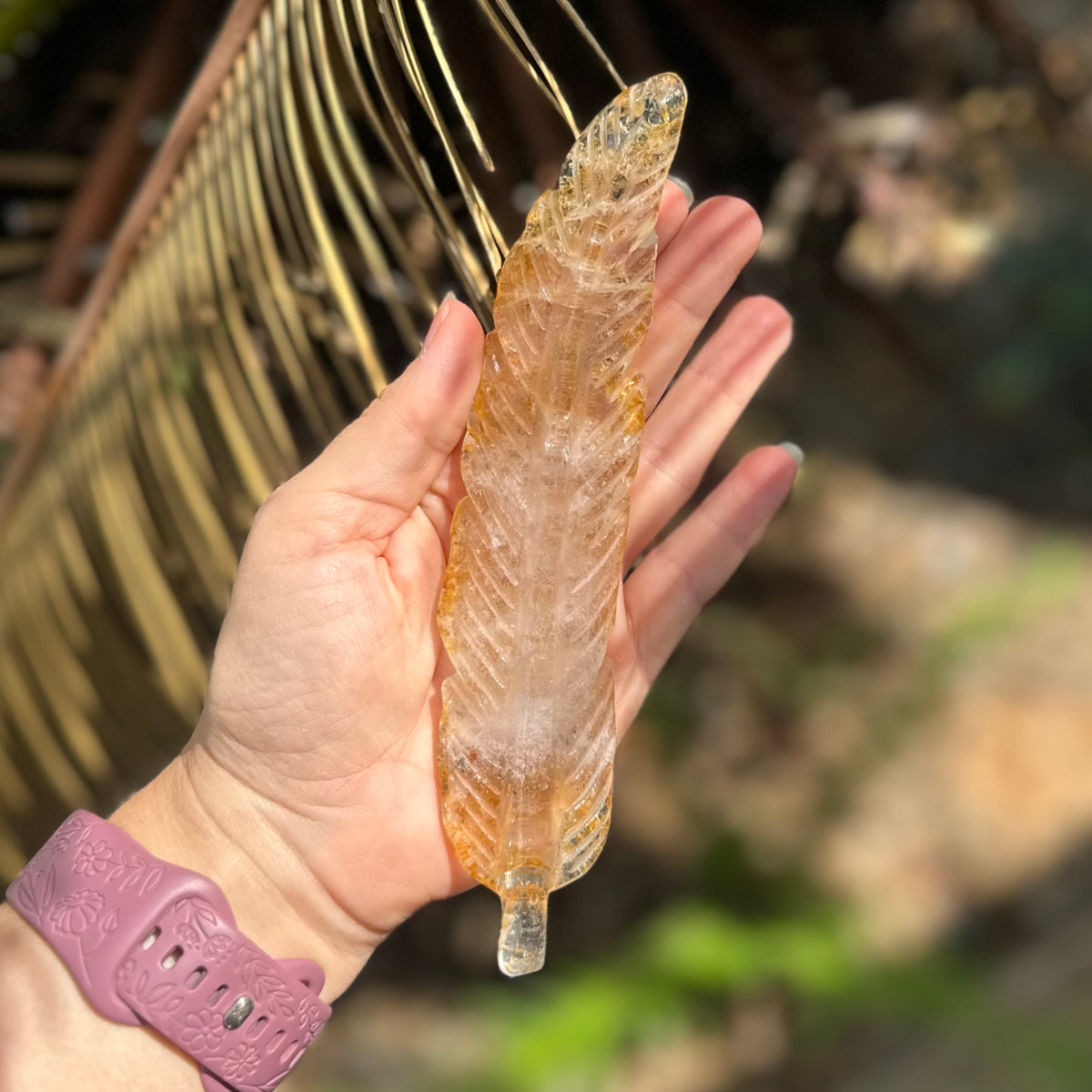 Golden Healer Feather Carving