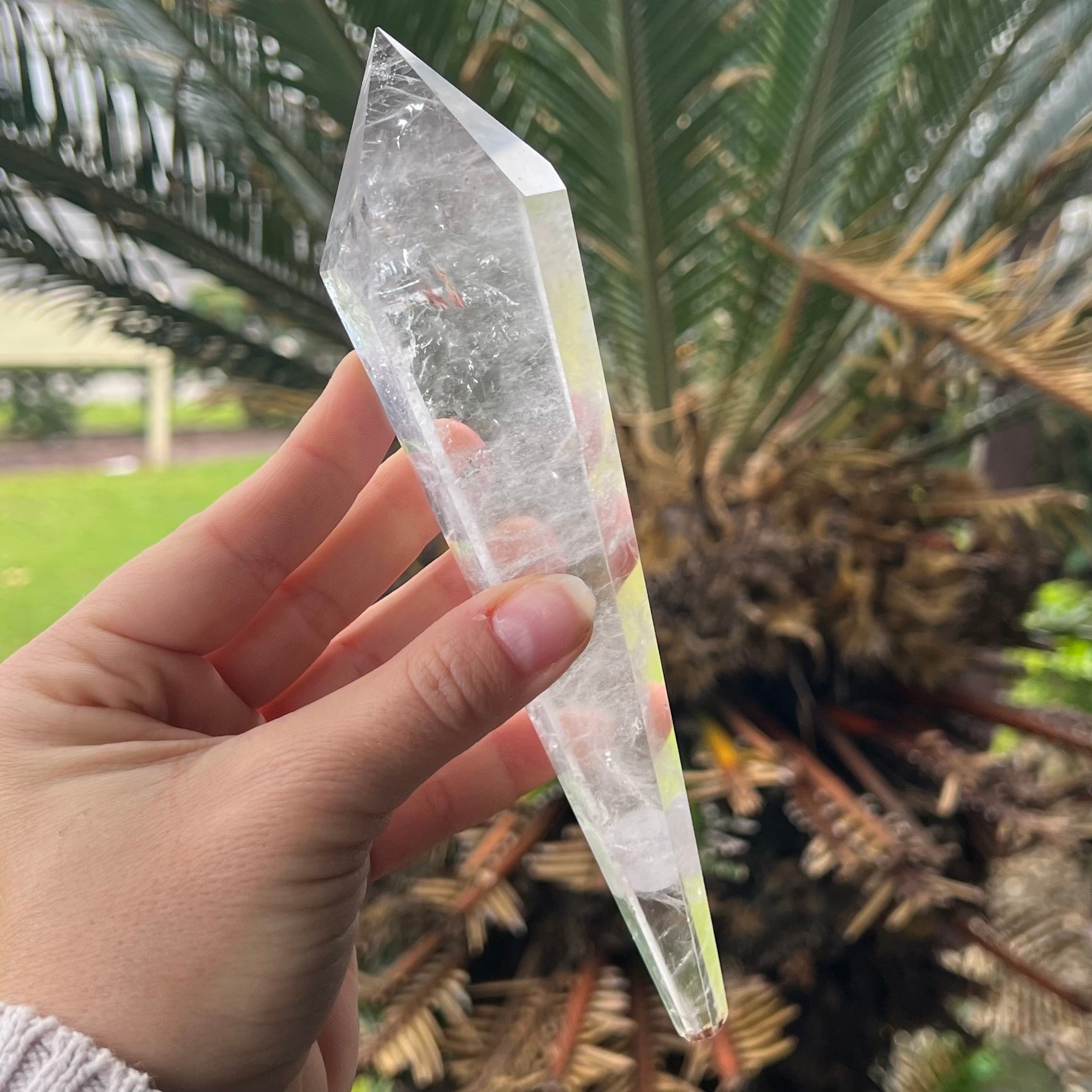 Clear Quartz Generator Wand on Stand
