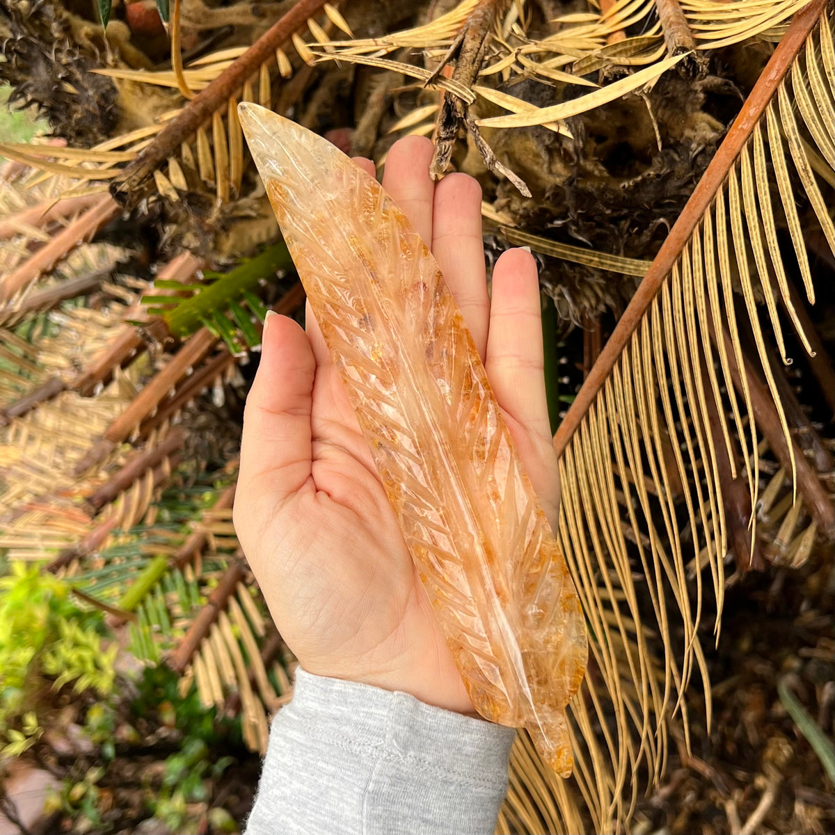 Golden Healer Feather Carving