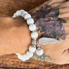 White Howlite Calming Bracelet with Angel Wing Charm