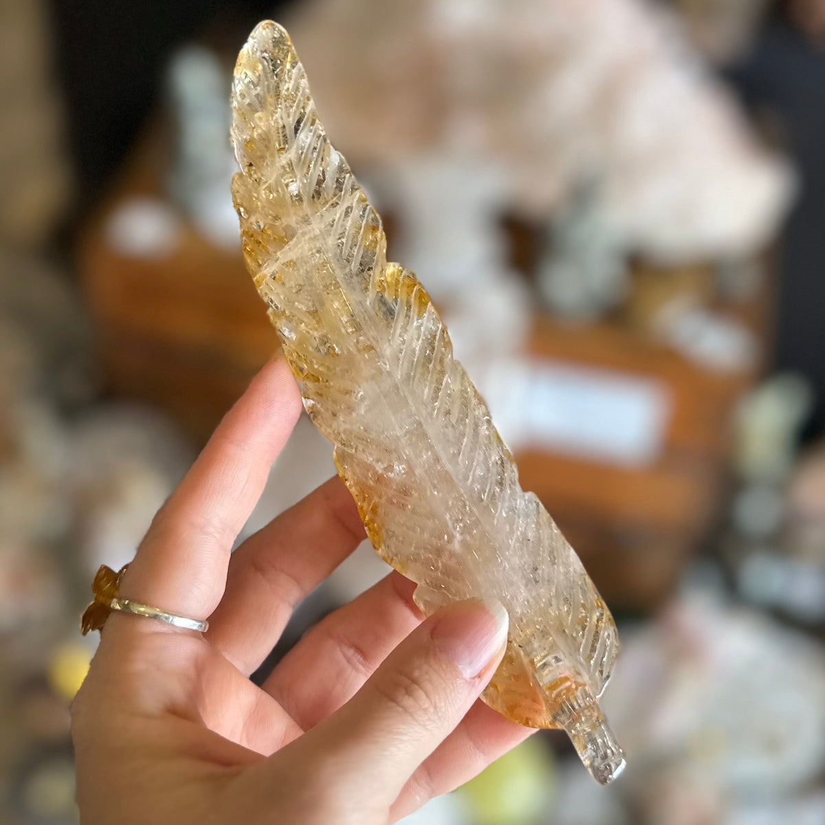 Golden Healer Feather Carving
