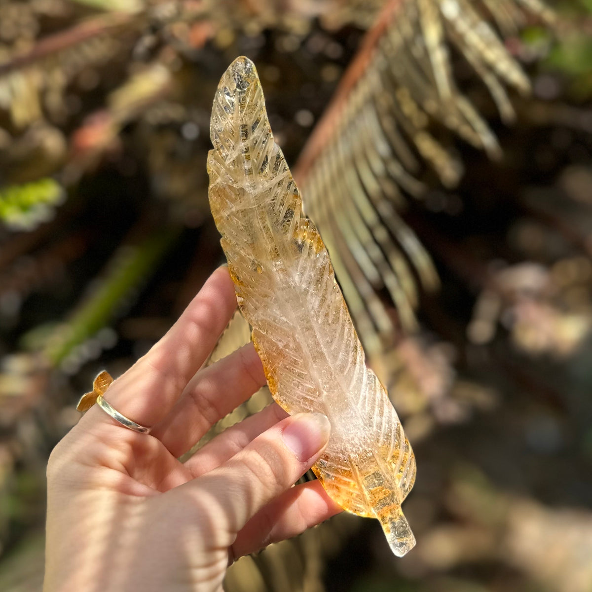 Golden Healer Feather Carving