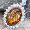 Oval Amber with Moissonite ~ Sterling Silver Pendant