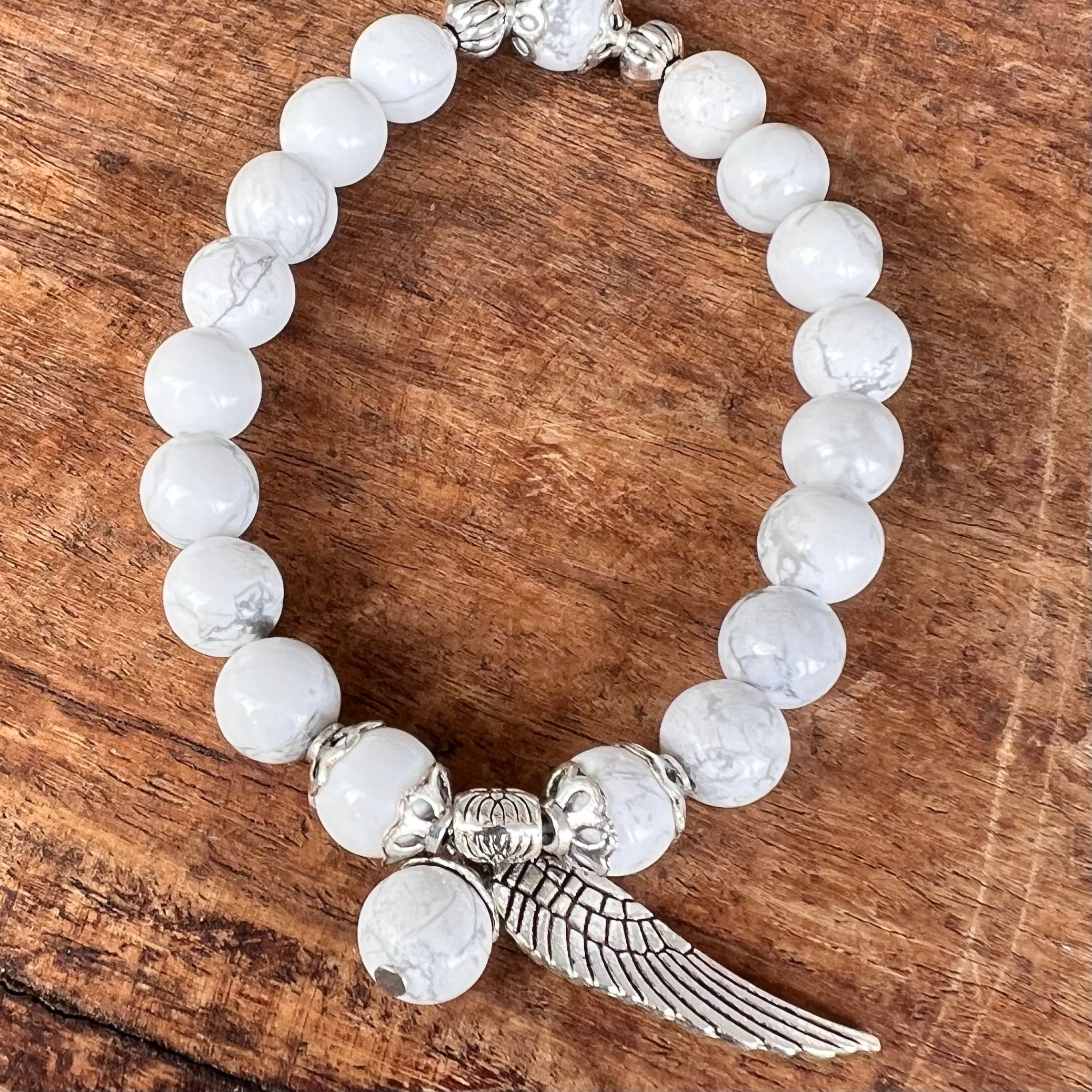 White Howlite Calming Bracelet with Angel Wing Charm